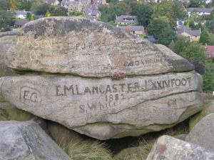 Names carved in rock on Ilkley moor