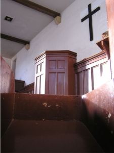 View of stark wooden pulpit