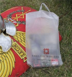 English Heritage carrier bag resting on Legionary shield