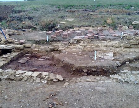 Remains of walls and underfloor heating for bath house